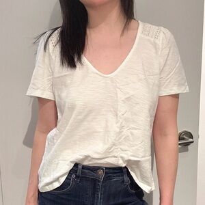 White V-Neck T-Shirt with delicate lace crochet detail on the shoulders